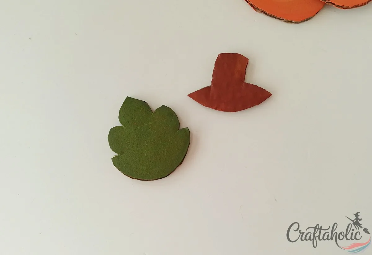 Cardboard leaf painted green and cardboard stem painted brown
