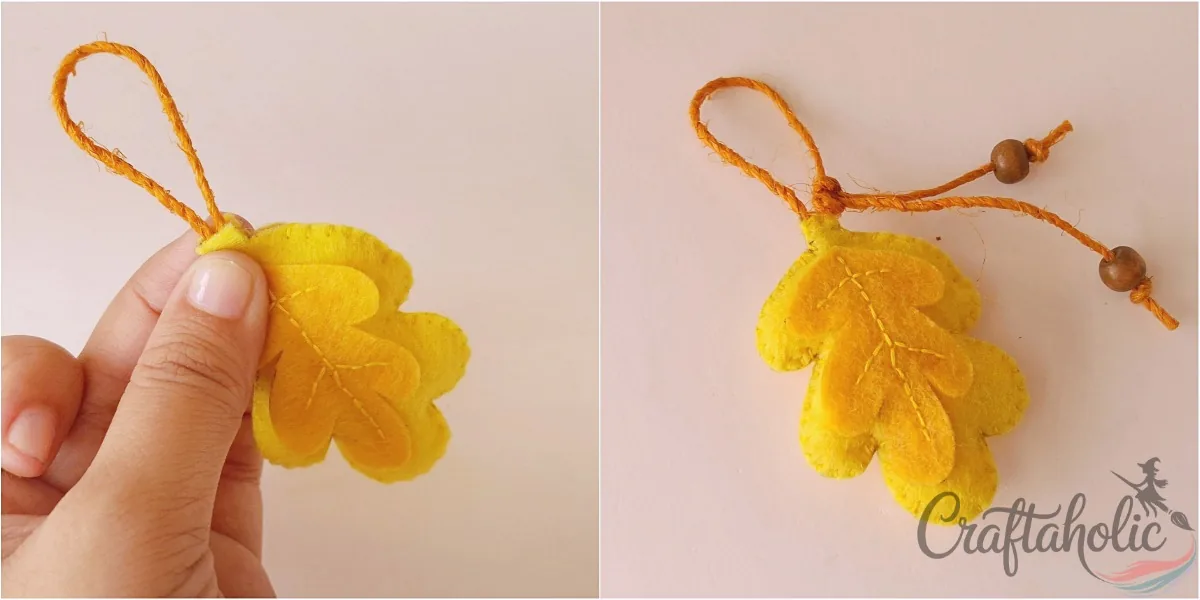 Felt leaf ornament, step 5 Attaching a string hanging loop between the stem parts of the felt leaf ornament