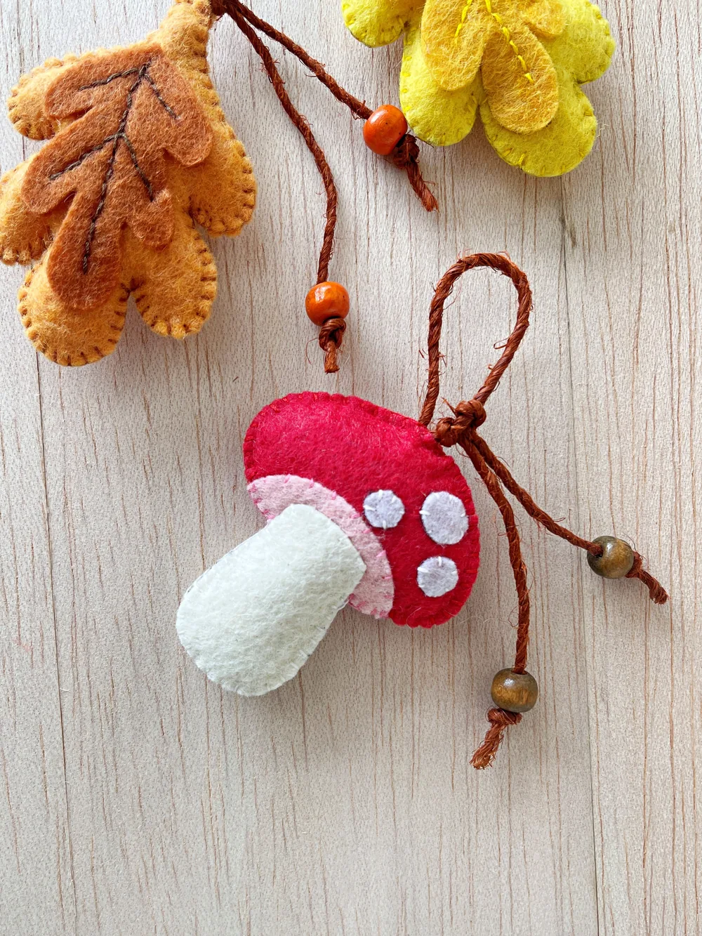 Finished felt mushroom ornament Finished felt mushroom ornament with a red cap, white dots and a hanging loop