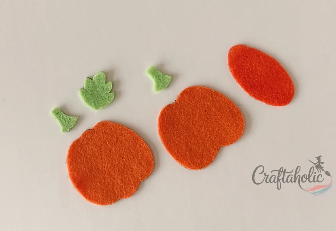 Felt pumpkin ornament, step 1 Felt pumpkin pattern pieces: stem, leaf, back base, front base and middle layer