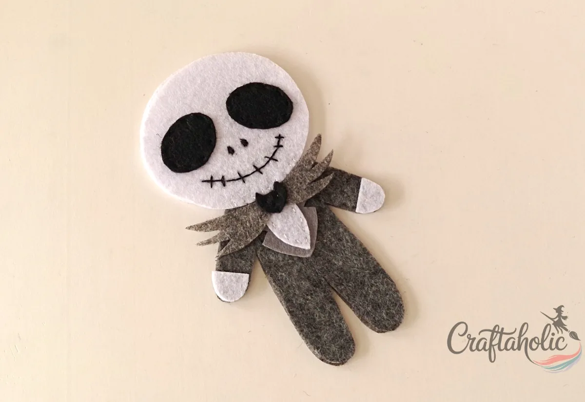 Jack's front on back Front part of the felt Jack doll placed on top of the back part