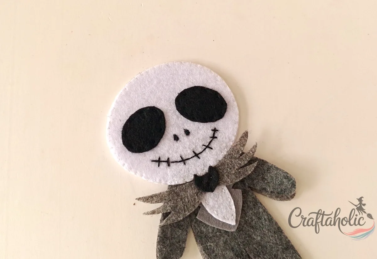 Jack's head stitched Felt Jack doll head layers stitched together with white thread