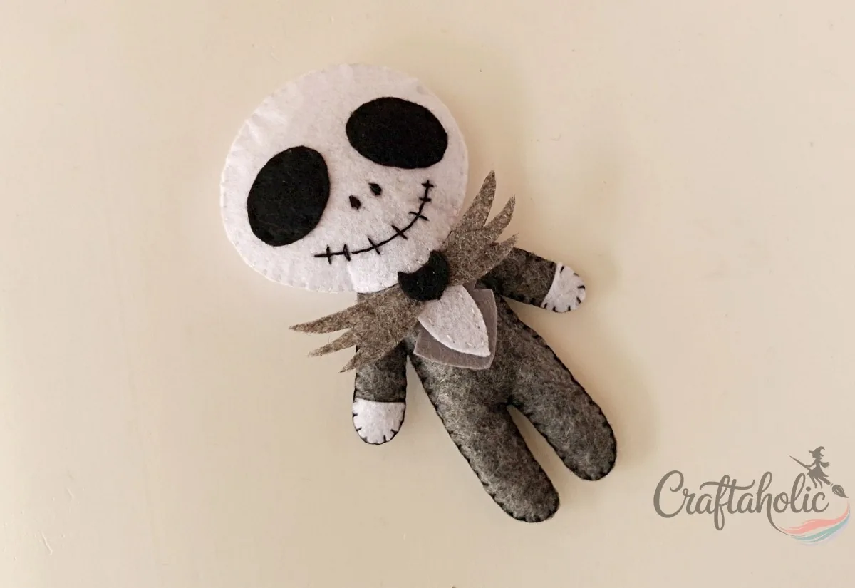 Finished Jack doll Finished felt Jack doll with the sides stitched closed and the thread secured